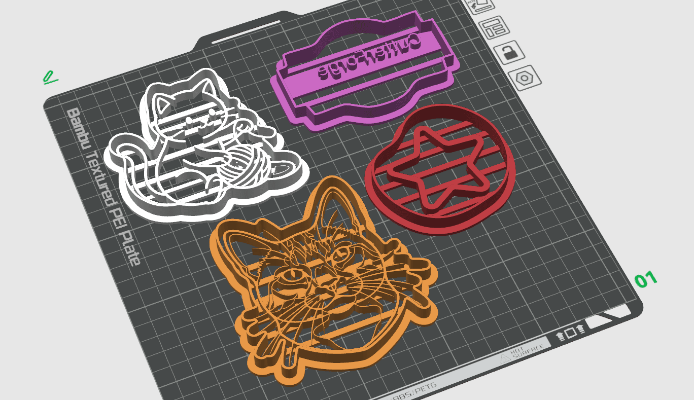Cookie cutter STL files arranged on a slicer build plate